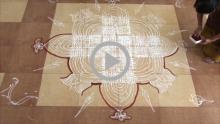 Making of Nalvaravu kolam